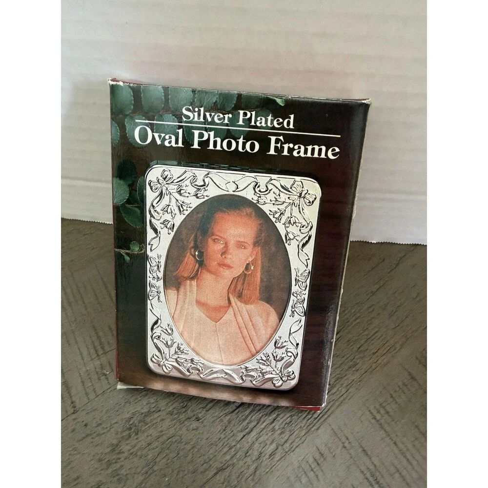 Silver Plated 3x4 (8cm X 10cm) Frame Floral And Ribbon Designed Edges